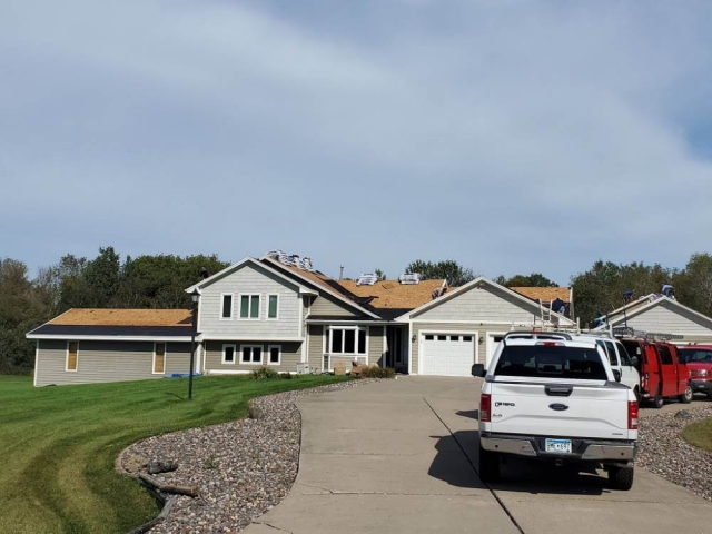 another view of the home with tear off nearly complete