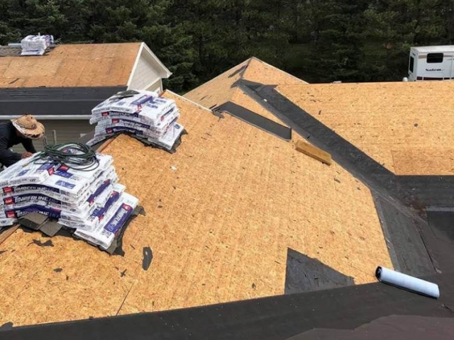 View of the roof decking after stripping off the old shingles.